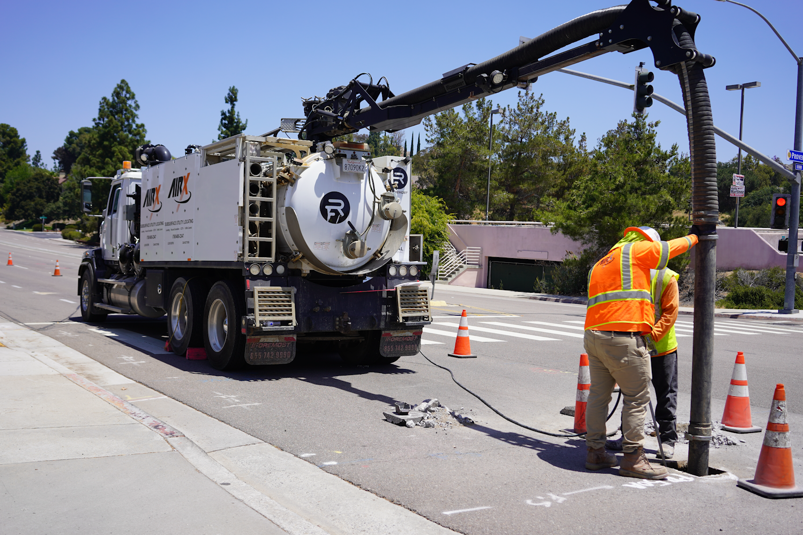 An AirX team member by an AirX truck